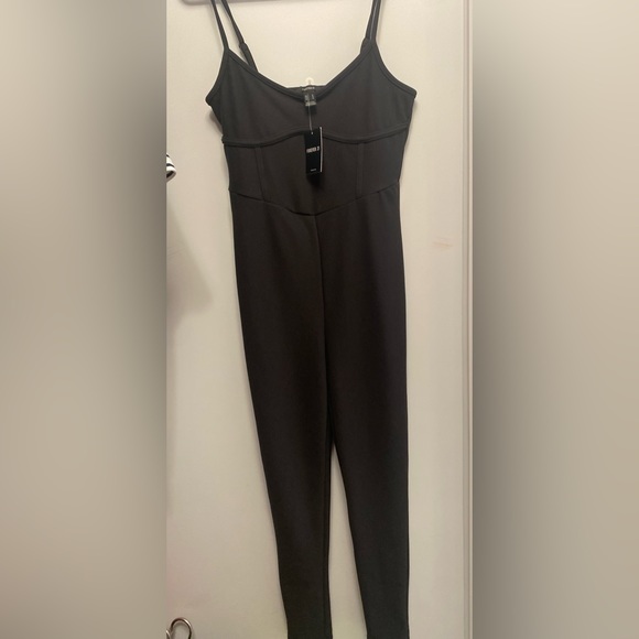 Sleek Black jumpsuit - Picture 1 of 3